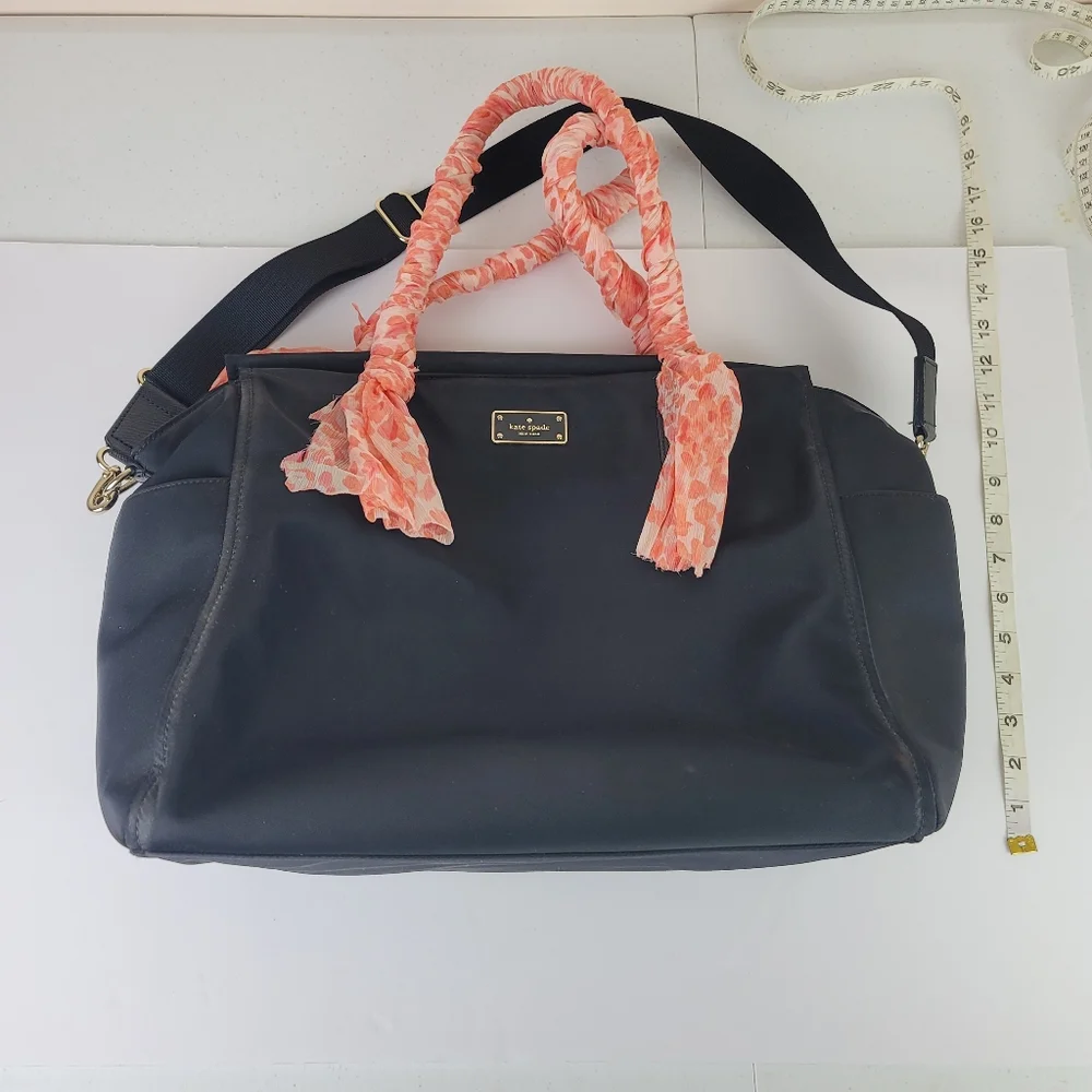 Kate Spade black diaper back, Peachy coral wrapped handles